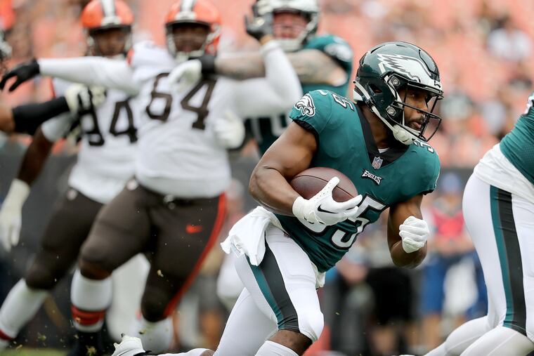 Philadelphia Eagles running back Boston Scott cuts to the outside on a run in the first quarter against the Browns. Philadelphia Eagles win 21-20 over the Cleveland Browns in a preseason game in Cleveland, Ohio on Sunday, Aug. 21, 2022.