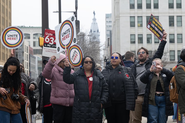 Community members rally prior to a school board meeting outside the Philadelphia school district headquarters on Thursday.