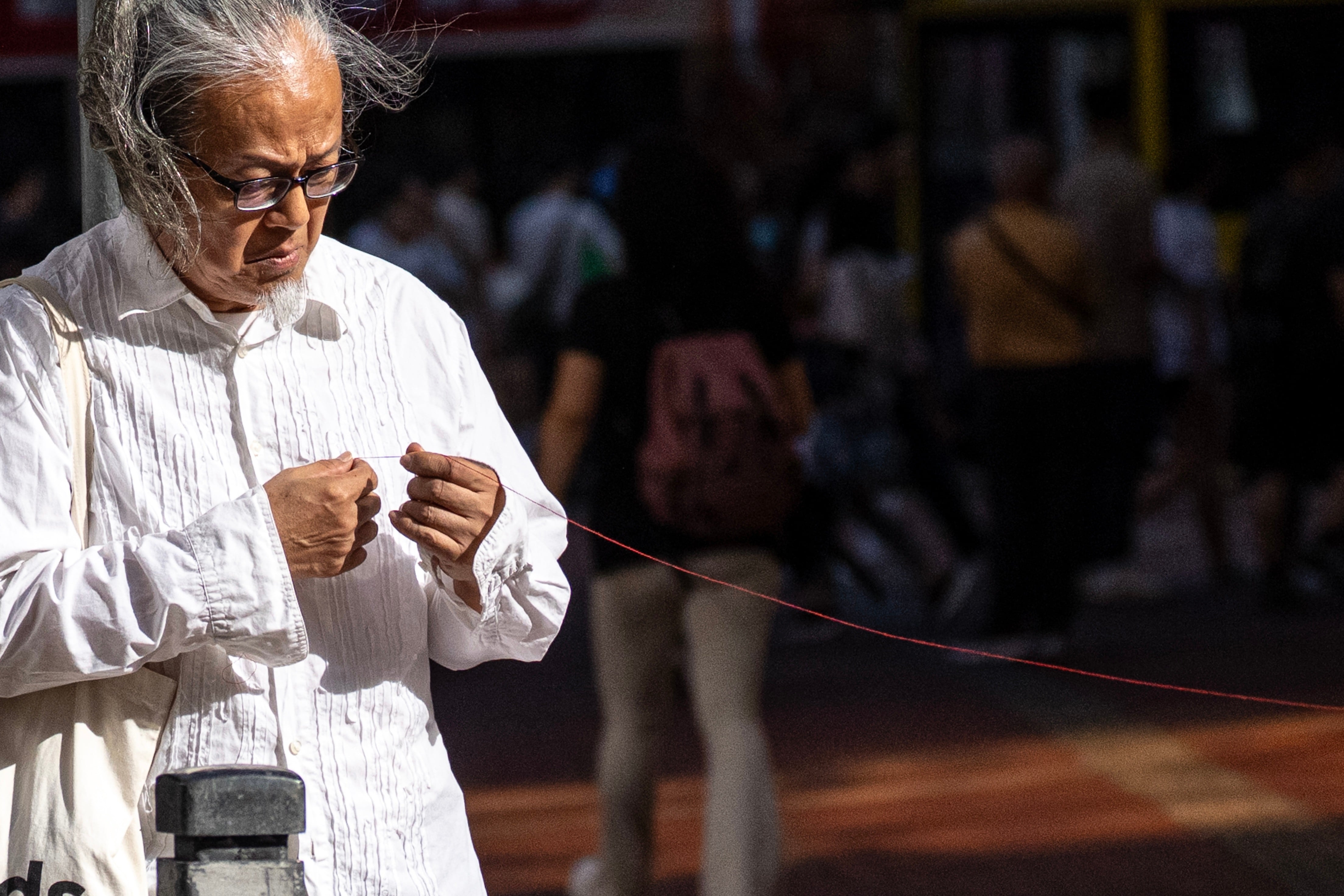 A Hong Kong artist trying to mark the Tiananmen crackdown is quickly stopped by police