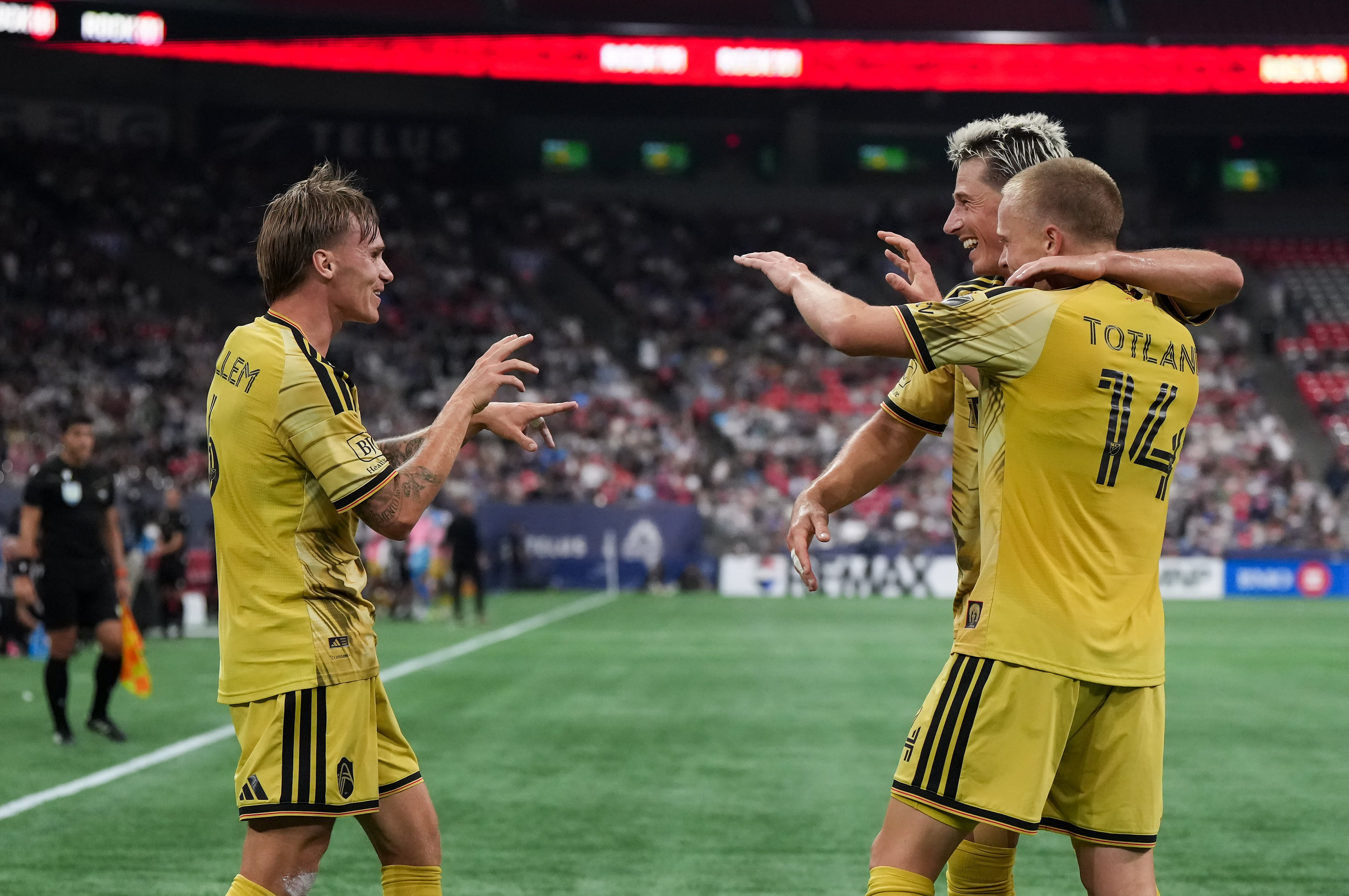 Tomas Totland and Conrad Wallem score 4 minutes apart as St. Louis City beats the Whitecaps 3-1