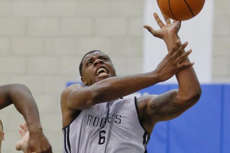 Terrence Jones (6) looses control of the ball as he is guarded by Utah Jazz's Rick Jackson (96) during an NBA summer league basketball game, Tuesday, July 9, 2013, in Orlando, Fla. (John Raoux/AP file)
