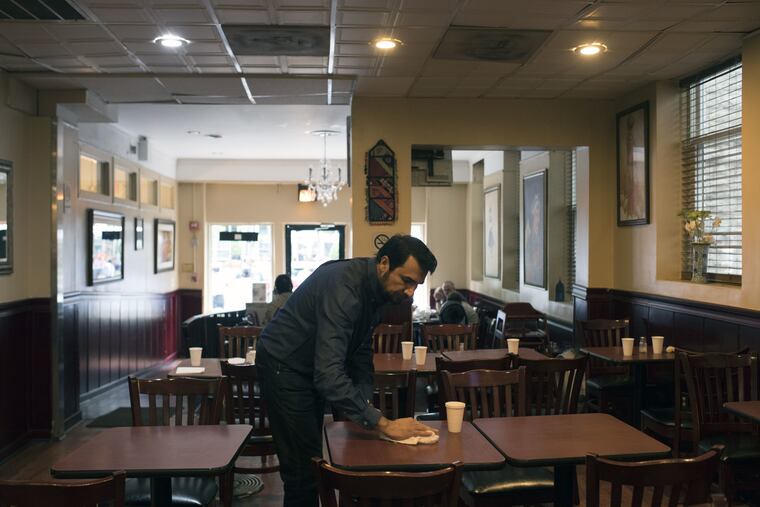 Kazi Mannan, the owner of Sakina Halal Grill, in his restaurant in 2017.