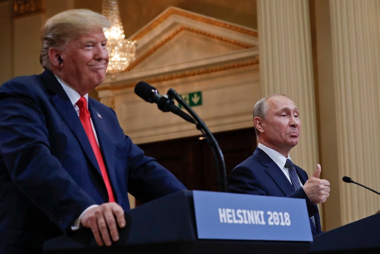 Russian President Vladimir Putin and then-President Donald Trump in Helsinki in 2018. Putin has played Trump for a fool, writes Trudy Rubin, and the Russian dictator is likely delighted at a prospective U.S. aid cutoff for Ukraine.