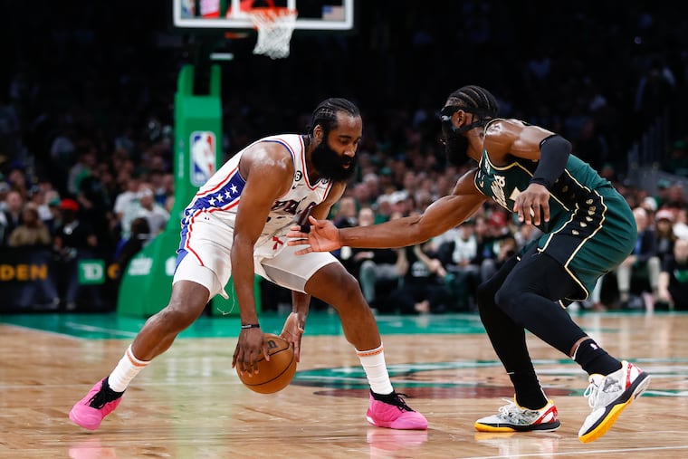The Sixers' James Harden is guarded by Boston's Jaylen Brown during Game 5 of the Eastern Conference semifinals on May 9.