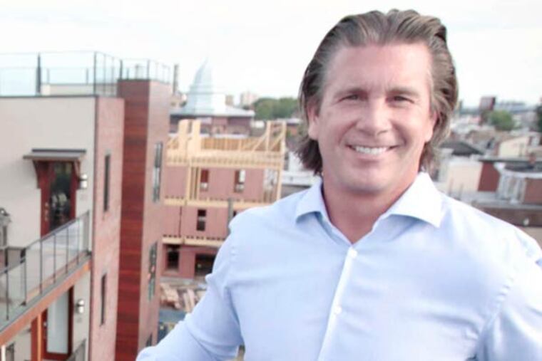 Jim Maransky on the steps leading to the roof of his completed Phase I project, with his recently completed Phase II part of the The Icehouse in Fishtown on the left on Sept. 3, 2014. ( ELIZABETHROBERTSON / Staff Photographer )