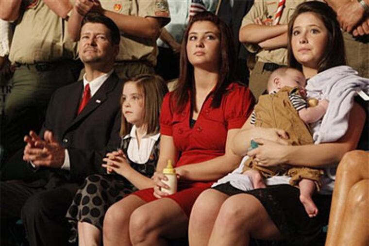Bristol Palin, 17, holds her brother Trig during the campaign rally where Republican presidential candidate Sen. John McCain introduced Bristol and Trig's mom, Sarah Palin, as his vice presidential running mate in Dayton, Ohio. (AP Photo / Stephan Savoia)