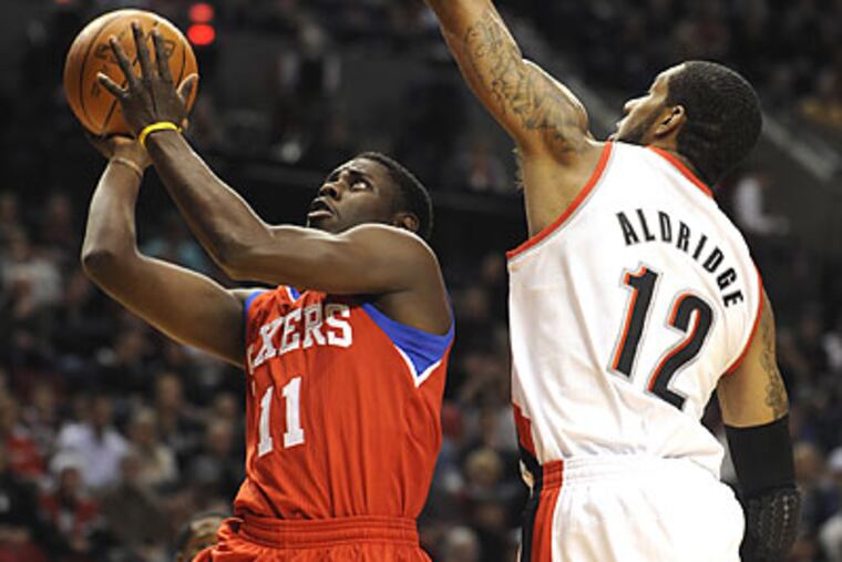 Jrue Holiday seemed to play at a quickened pace Monday night that isn't quite suitable to his style. (Greg Wahl-Stephens/AP)