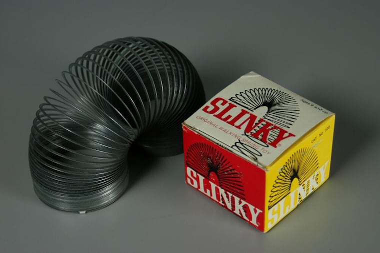 A Slinky from 1970 pictured with the original box.