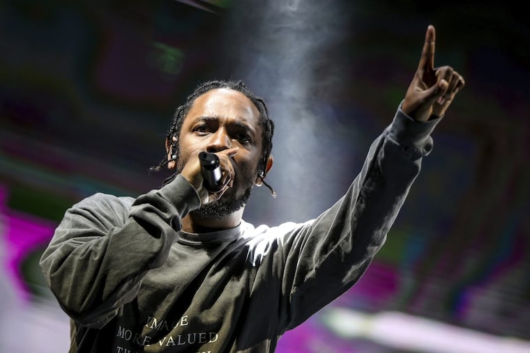 FILE – In this Aug. 27, 2016 file photo, Kendrick Lamar performs at FYF Fest in Los Angeles. Lamar’s third official studio album, "DAMN." has sold over 1 million albums in just three weeks, and has spent all three weeks at No. 1 on Billboard’s 200 albums chart.