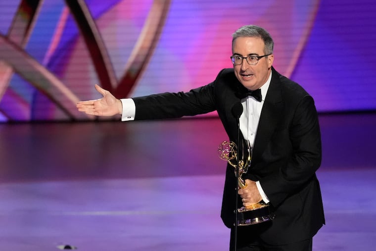 John Oliver accepts the award for outstanding scripted variety series for "Last Week Tonight With John Oliver" during the 76th Primetime Emmy Awards in 2024 at the Peacock Theater in Los Angeles.