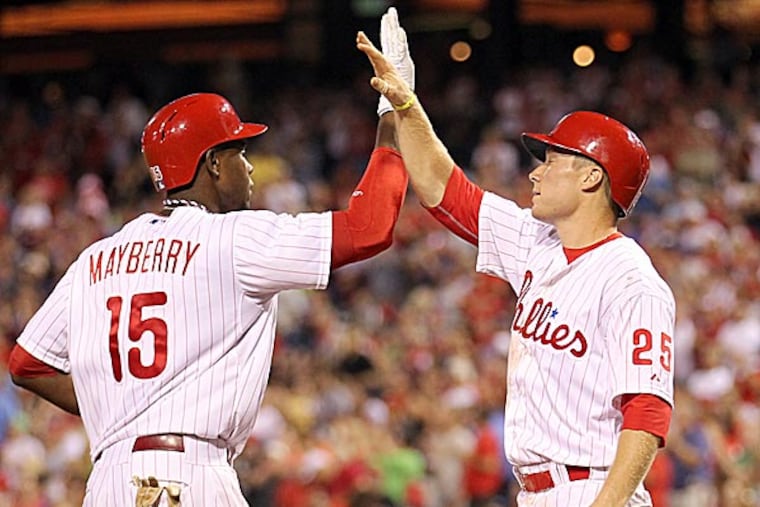 The Phillies' John Mayberry, Jr. celebrates his three-run home run with teammate Cody Asche in the fourth inning. (Yong Kim/Staff Photographer)