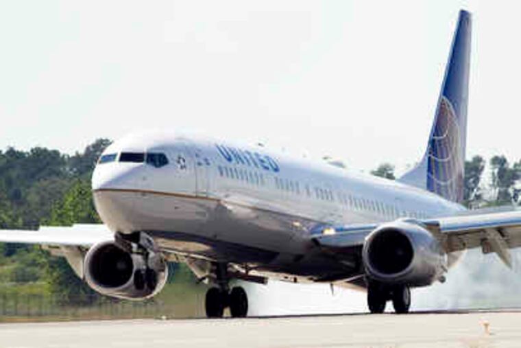 United's earnings were up from a loss a year earlier. Continental, its sister airline, had a loss in '09.