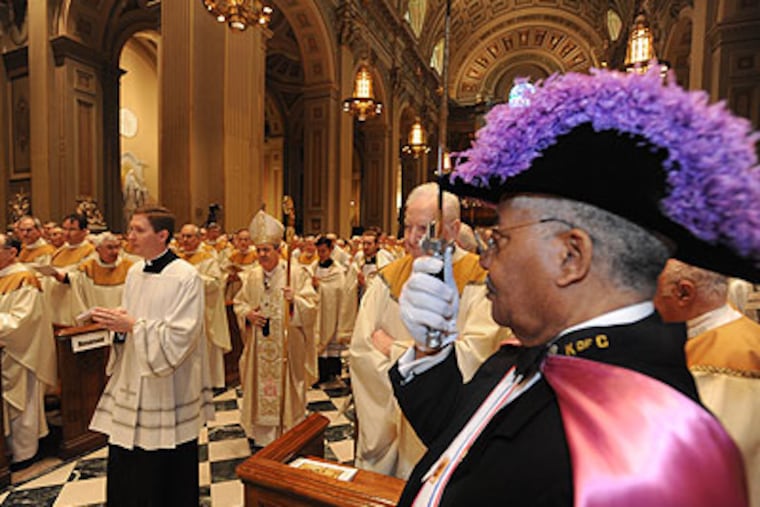 At the Cathedral of Sts. Peter and Paul, a "Chrism" mass, where oil is blessed and hundreds of priests renew their vows, was held Holy Thursday with Cardinal Justin Rigali in the processional. (April Saul / Staff Photographer)