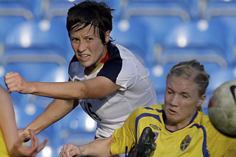 Megan Rapinoe contributed four goals and two assists for the U.S. national team in 2010. (Armando Franca/AP file photo)