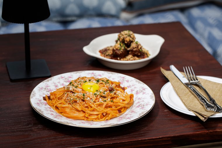 The Gochujang carbonara and Oaxacan meatballs at the Iron Room on Thursday, June 11, 2026 in Atlantic City, NJ. The Iron Room is hidden behind a door at Bar 32.