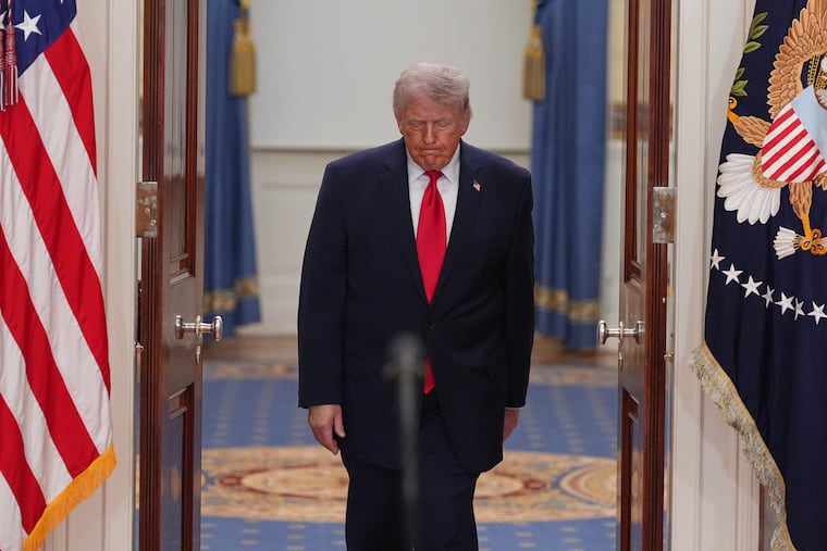 President Donald Trump arrives to speak about the Iran war from the Cross Hall of the White House on Wednesday.