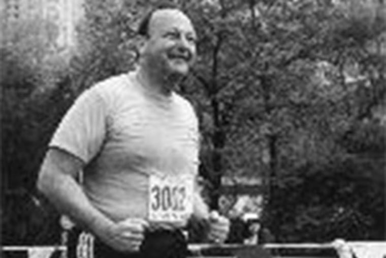 Frank E. Greenberg received honors for his track officiating.