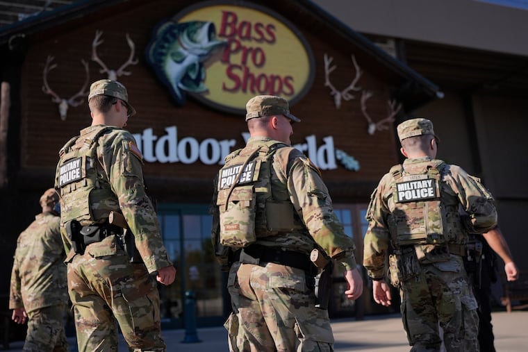 Members of National Guard patrol in Memphis, Tenn., on Friday.