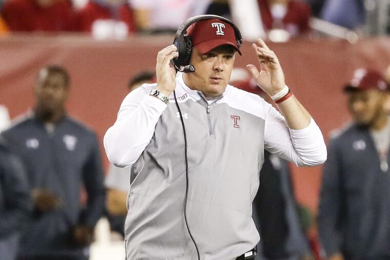 Temple Head Coach Geoff Collins adjusts his headset against Navy on Thursday, November 2, 2017 in Philadelphia. YONG KIM / Staff Photographer