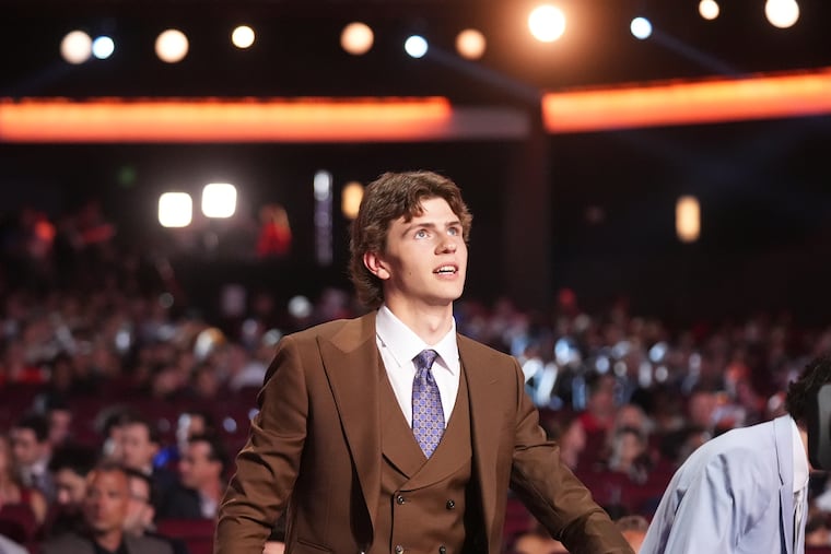 Jack Nesbitt walks to the stage after being drafted by the Flyers with the 12th pick.