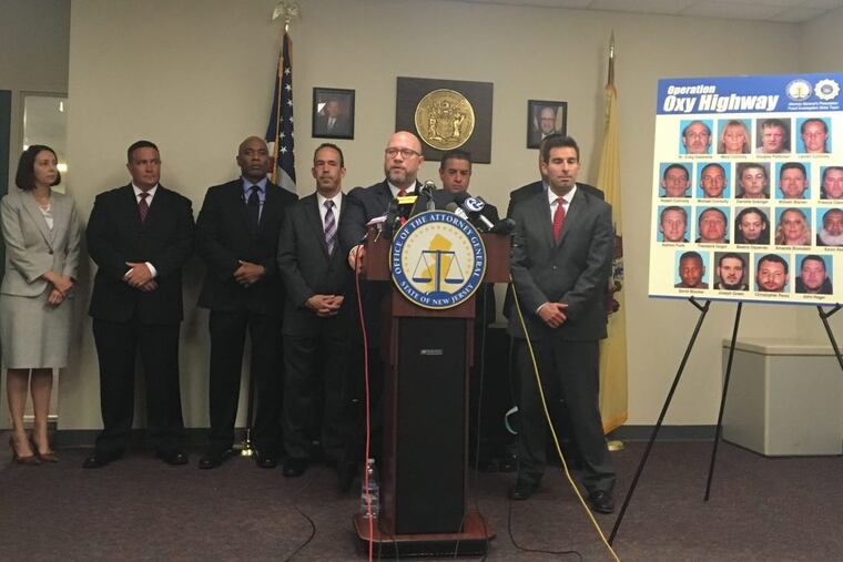 New Jersey Attorney General Chris Porrino announces the arrests of an Essex County doctor and 17 alleged members of a drug ring