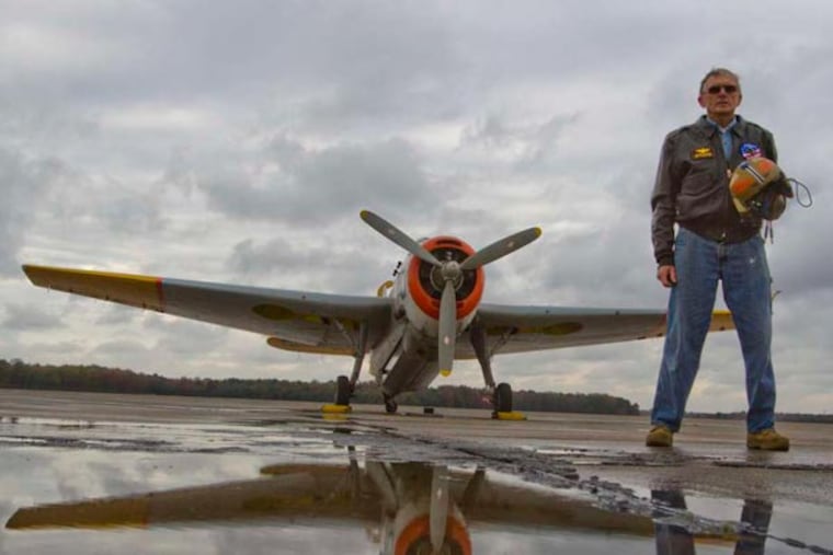 F. Edward Wuerker and his World War II, 1945 TBM Avenger, at Cape May Airport, October 23, 2013. ( DAVID M WARREN / Staff Photographer )