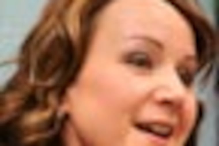 John Webster Elementary School principal Christine Borrelli-Conner (cq) in her office at the school March 30, 2012. She is among seven recipients of the Lindback Distinguished Principal Award. ( TOM GRALISH / Staff Photographer )