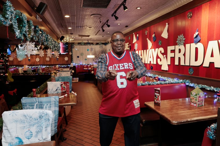 Restaurant manager Tim Hampton wearing a Julius Erving jersey at TGI Friday’s, which turned into a nightclub of sorts in Allen Iverson's heyday.