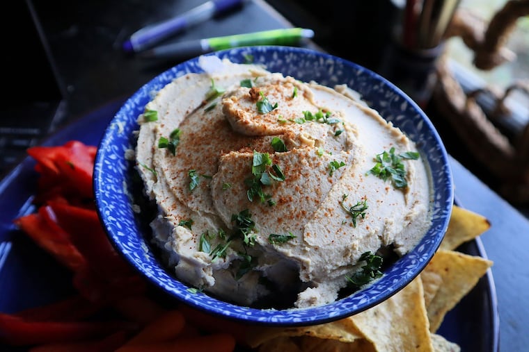 Hummus, the creamy Middle Eastern dip made with chickpeas and tahini paste, is one of the author's favorite comfort foods.