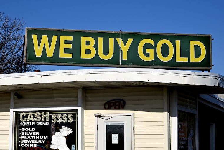 A “We Buy Gold” sign on Route 206 in Burlington County. As gold and silver prices have risen, dealers are seeing an increase in customers wanting to cash in jewelry they own or inherited.