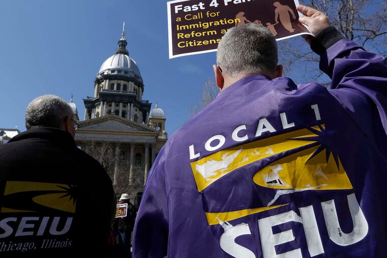 Members of the Service Employees International Union rallying in Illinois in support of immigration reform. Unions are partnering with community group and churches to reach out to immigrants.