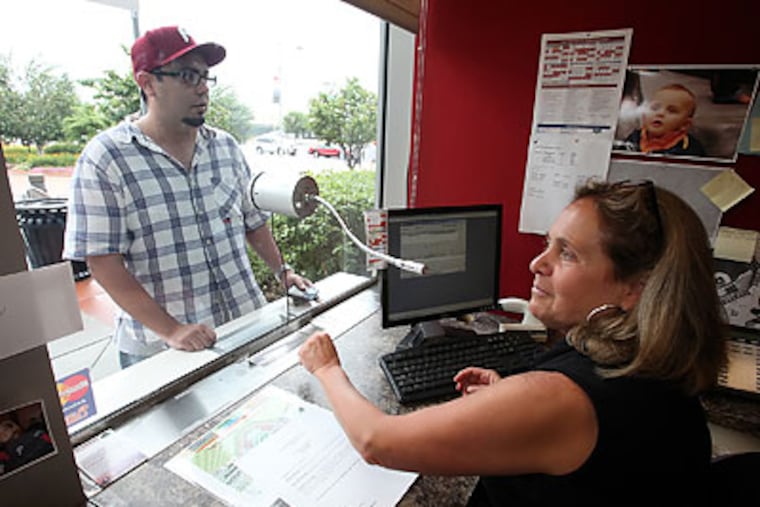 A limited number of standing-room-only tickets are sold before each Phillies home game. (Steven M. Falk/Staff Photographer)