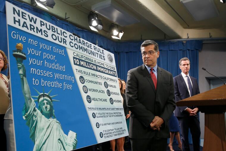 California Attorney General Xavier Becerra, left, and Gov. Gavin Newsom, in Sacramento, Calif., Aug. 16, 2019. They announced that California has joined three other states and the District of Columbia in a lawsuit filed Friday against some of the administration's moves to restrict legal immigration that are supposed to take effect in October.