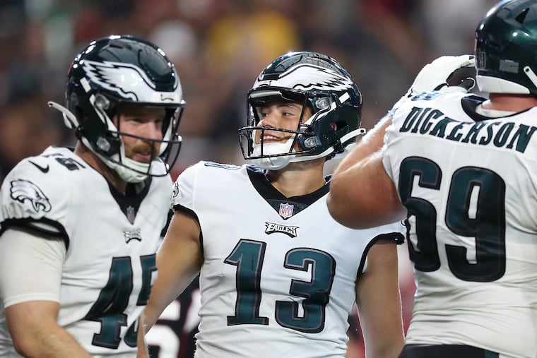 Philadelphia Eagles kicker Cameron Dicker (center) smiles after his fourth quarter field goal was good giving the Eagles a 20-17 lead over the Cardinals. Eagles win 20-17 over the Cardinals at State Farm Stadium in Glendale, Ariz. on Sunday, Oct. 9, 2022.