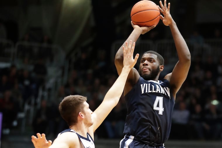 Villanova forward Eric Paschall (4) shoots over Butler forward Nate Fowler (51) in the first half of an NCAA college basketball game in Indianapolis, Tuesday, Jan. 22, 2019. (AP Photo/Michael Conroy)