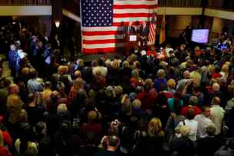 Former President Bill Clinton addresses Democratic activists in Collingswood as Gov. Corzine stands beside him. Clinton said voters' troubles were keeping them from focusing on Corzine's record as governor, which he praised.