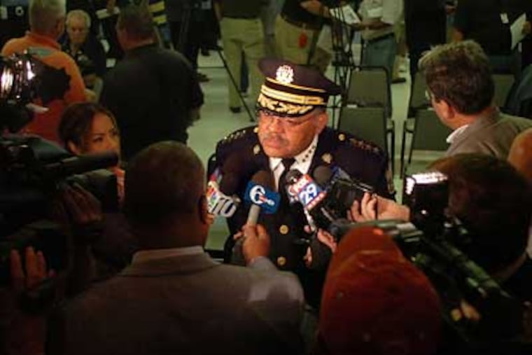 Police Commissioner Charles Ramsay talks with reporters after a scheduled press conference at the Fraternal Order of Police Lodge #5 on Monday. (Sarah J. Glover / Inquirer)