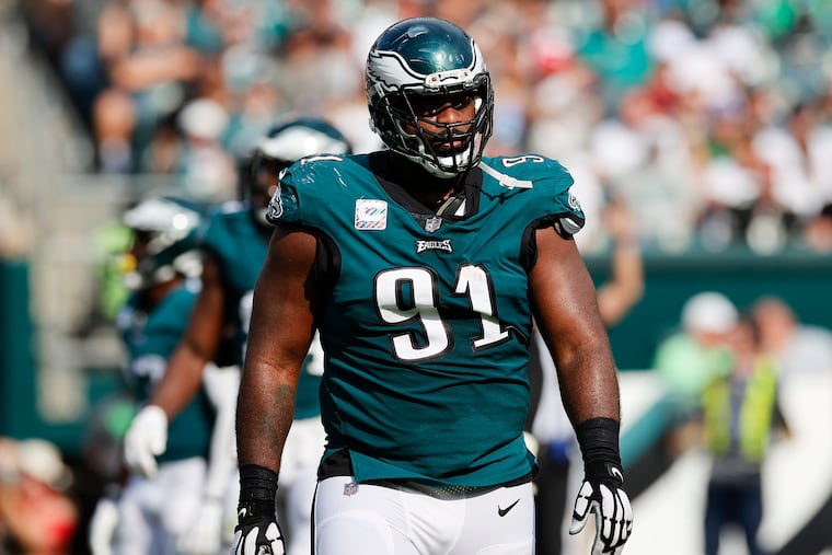 Eagles defensive tackle Fletcher Cox walking off the field against the Kansas City Chiefs on Sunday.