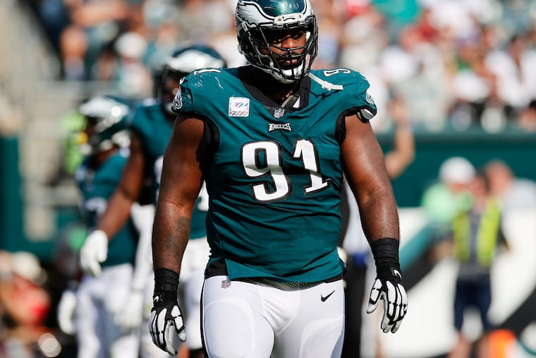 Eagles defensive tackle Fletcher Cox walks off the field against the Kansas City Chiefs on Sunday, October 3, 2021 in Philadelphia. Cox, the long-time veteran, was the subject of trade rumors this week, but still remains with the team.