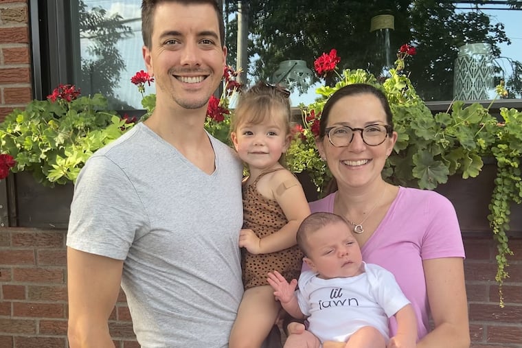Scott and Margo with kids Emmy and Landon.