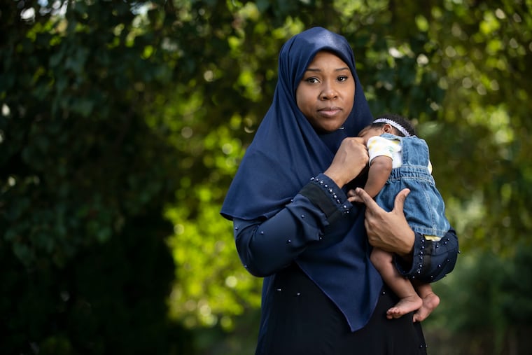 Sherell Robinson posed for portrait with her two month old daughter Illiyin Robinson, near her home in Philadelphia, Pa. Robinson has been getting treatment for postpartum depression over the past two months.