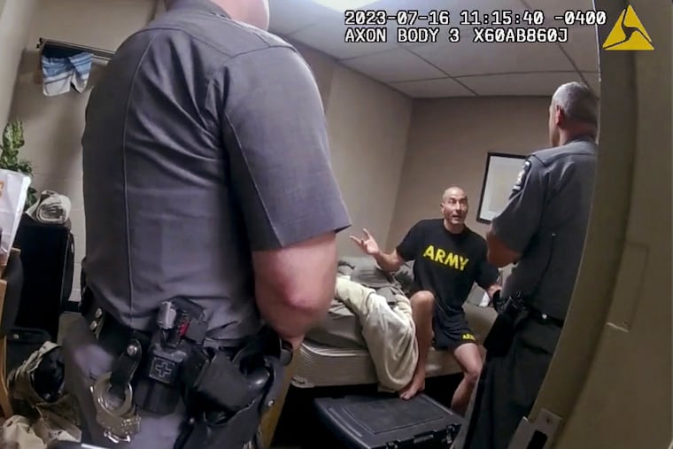 In this image taken from New York State Police body camera video that was obtained by WMTW-TV 8 in Portland, Maine, New York State police interview Army Reservist Robert Card, the man responsible for Maine's deadliest mass shooting, at Camp Smith in Cortlandt, N.Y., in July.