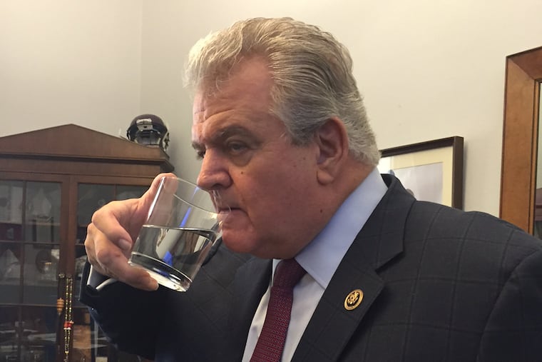 In this photo taken Thursday, Sept. 24, 2015, U.S. Rep. Bob Brady, D-Pa., drinks from a glass of water that Pope Francis used during his speech to Congress, while standing in Brady's Washington office. As Pope Francis left the chamber Thursday, Brady, who is Roman Catholic, headed to the lectern to retrieve the pontiff's drinking glass. (Stan White/U.S. Rep. Bob Brady's office via AP)