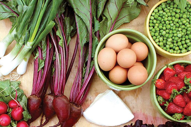 An early-season CSA share from Greensgrow Farms includes peas, strawberries, lettuce, radishes, scallions, beets, eggs, cheese - and more. (Photo: BRYN ASHBURN)