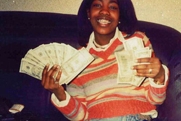 Asya Richardson, the former girlfriend of convicted drug kingpin Alton "Ace Capone" Coles, fell to the floor after a judget sentenced her Friday to 24 months in prison.