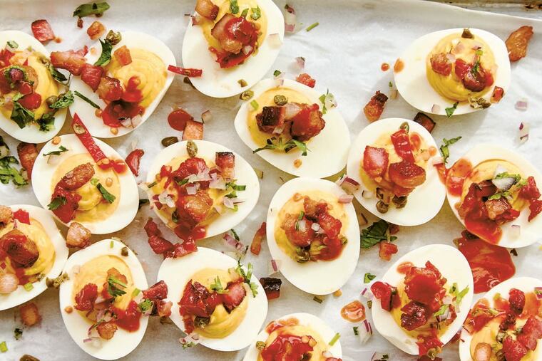 In 'Amá: A Modern Tex-Mex Kitchen,' deviled eggs are stuffed yolks mashed with mayo, mustard, cilantro, oil-packed Calabrian chiles, and capers.
