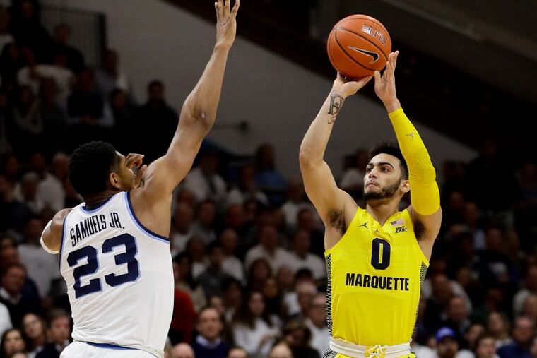 Marquette's Markus Howard, shown shooting over Villanova's Jermaine Samuels in a game last season at Finneran Pavilion, will be facing the Wildcats for the eighth time on Saturday.