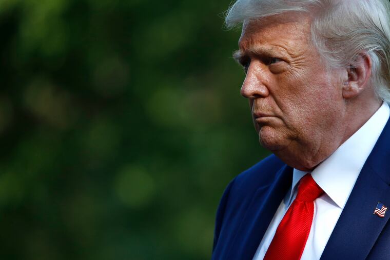 President Donald Trump walks on the South Lawn of the White House in Washington, Wednesday, July 15, 2020, after stepping off Marine One. Trump is returning from Atlanta.