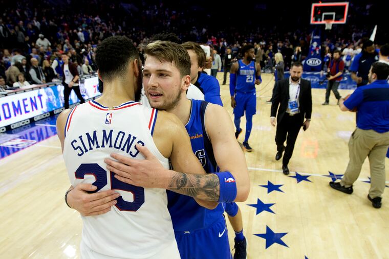 The Sixers' Ben Simmons greets Dallas' Luka Doncic after a game at the Wells Fargo Center in January of last season