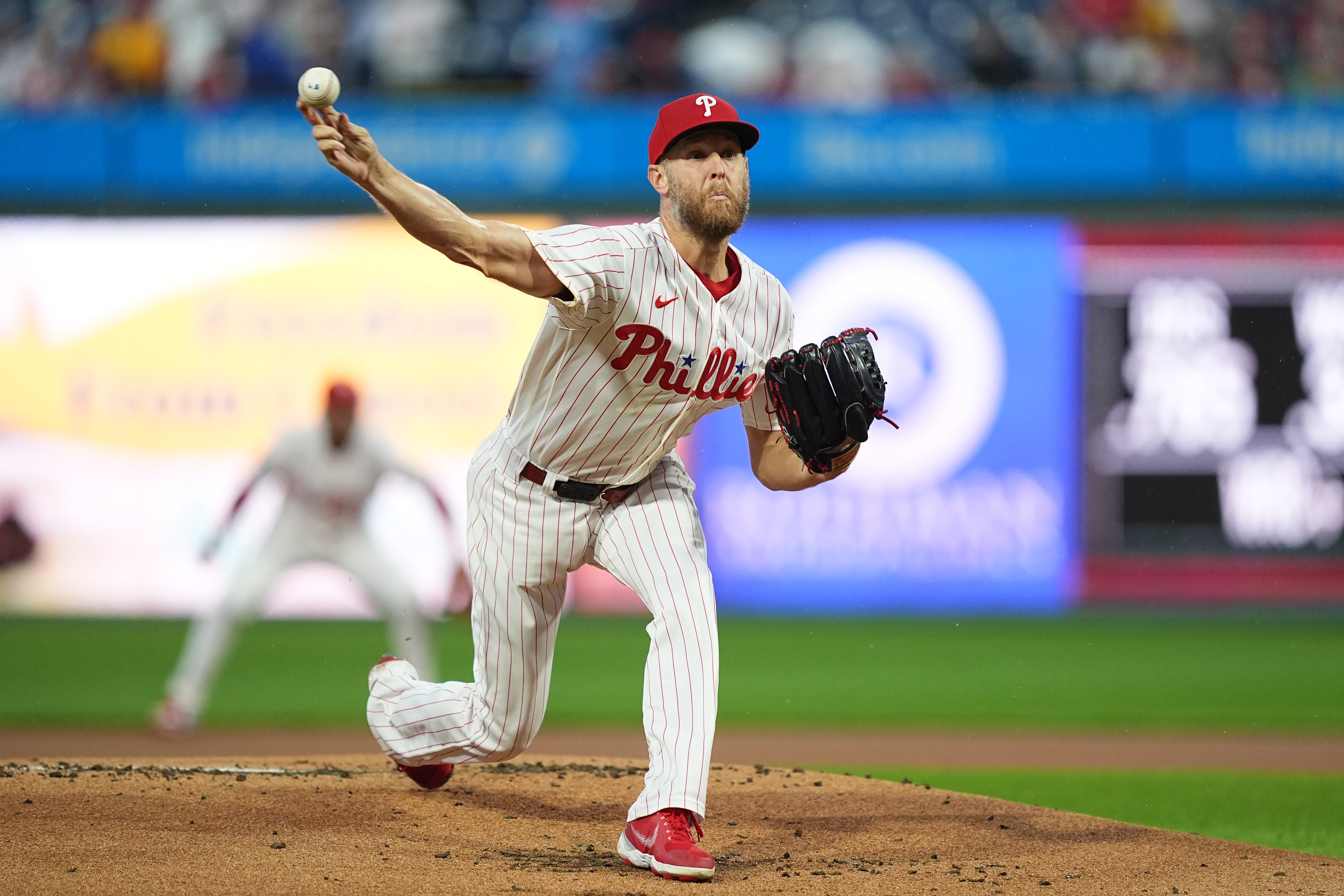 Wheeler fans 7 straight to open game, Stott hits tiebreaking single as Phillies beat Brewers 6-4